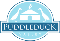 The logo of Puddleduck Valley for Family Devon Holidays